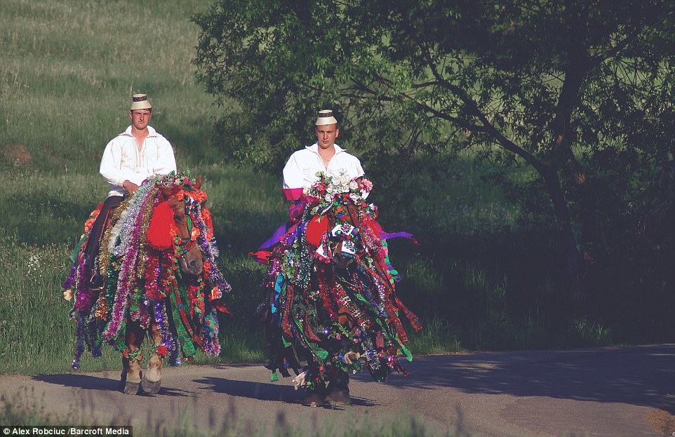 These two men are travelling to a wedding in the village of Maramures in Romania in a tradition which hasn't changed in 800 years