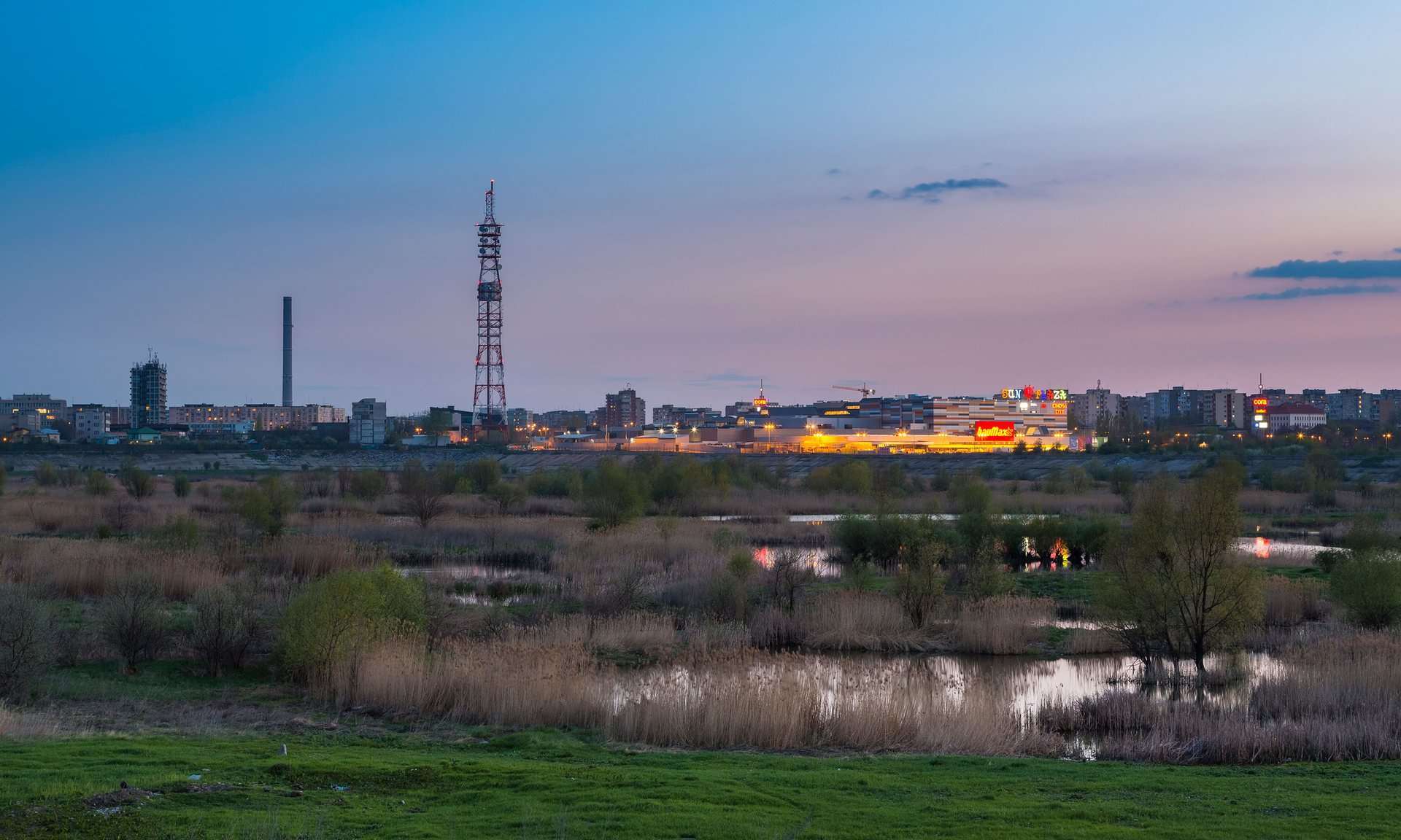 Nightfall over the south-eastern Bucharest suburbs near Văcărești Lake. Photograph: Alamy