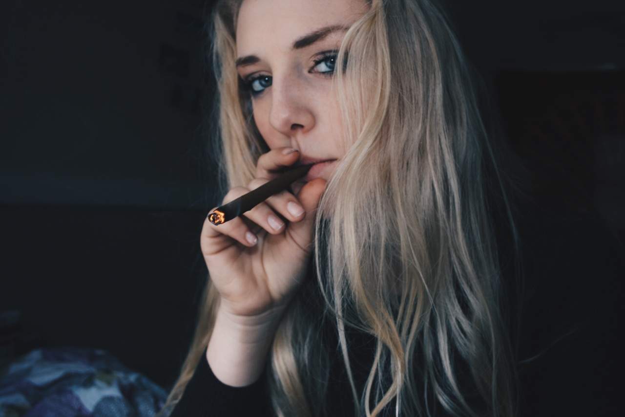 Girl smoking blunt